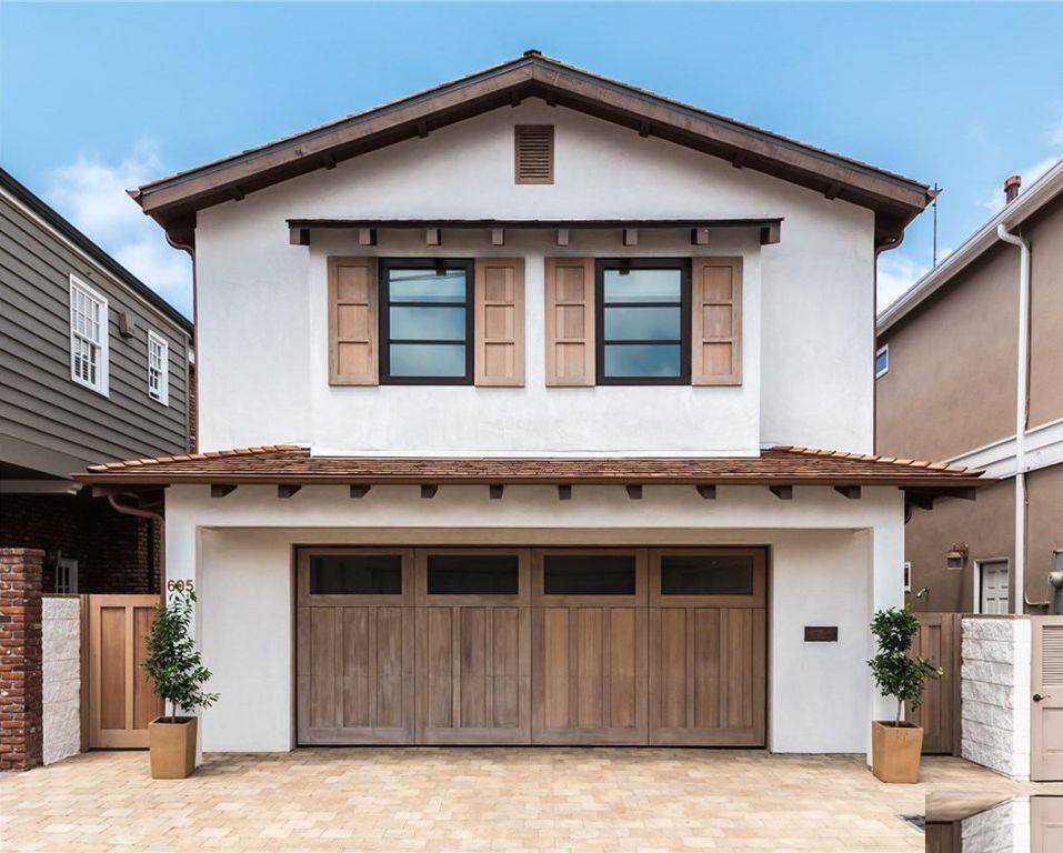 Corona del Mar coastal-style home exterior by Shipwright Homes