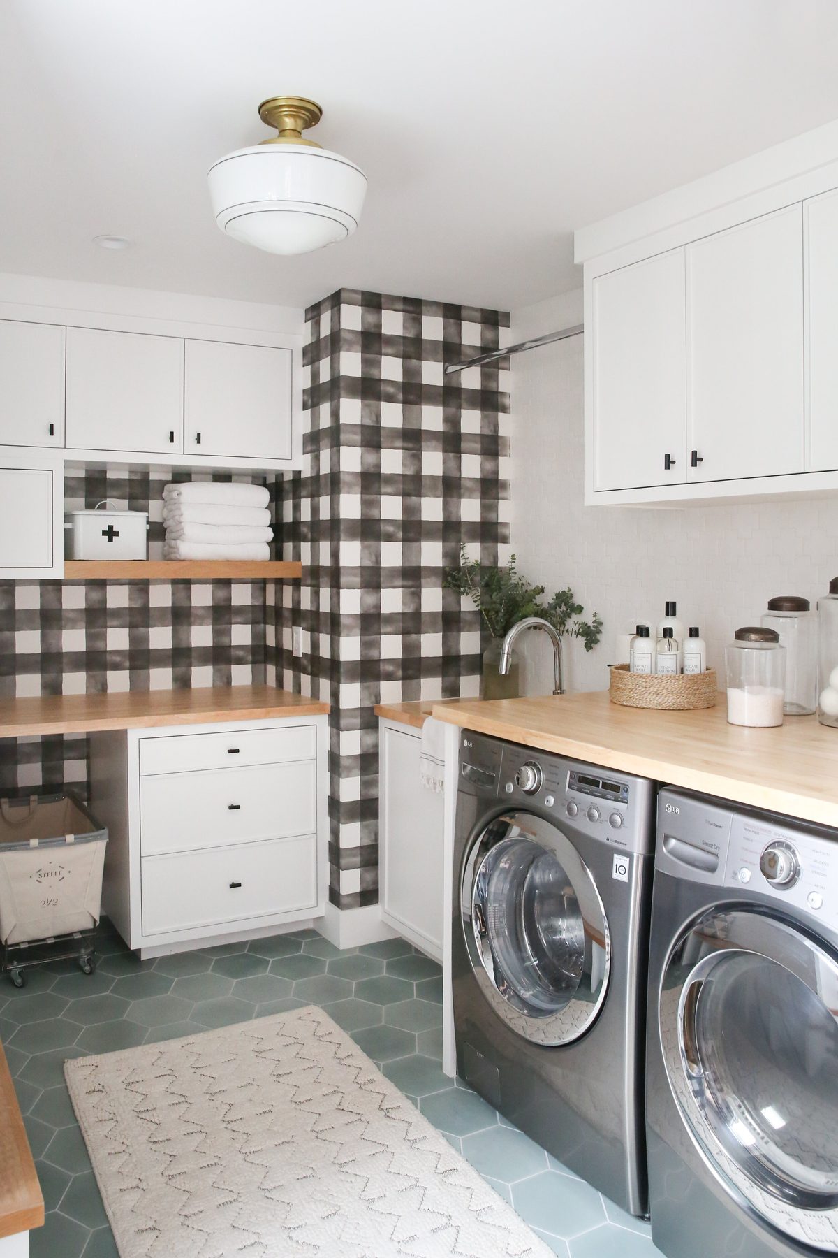 Refinished white cabinetry with updated hardware