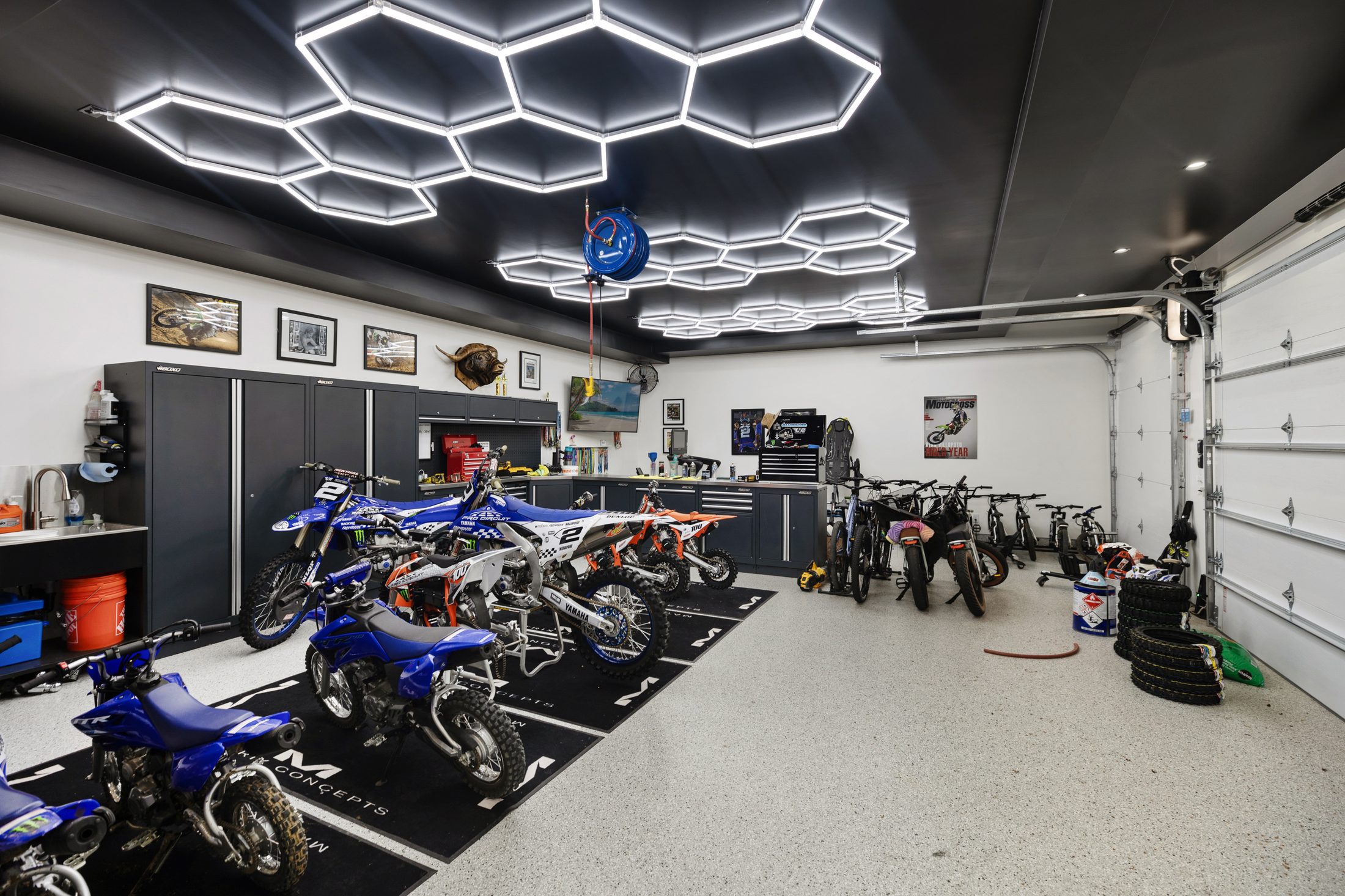 Custom garage interior with hexagonal lighting