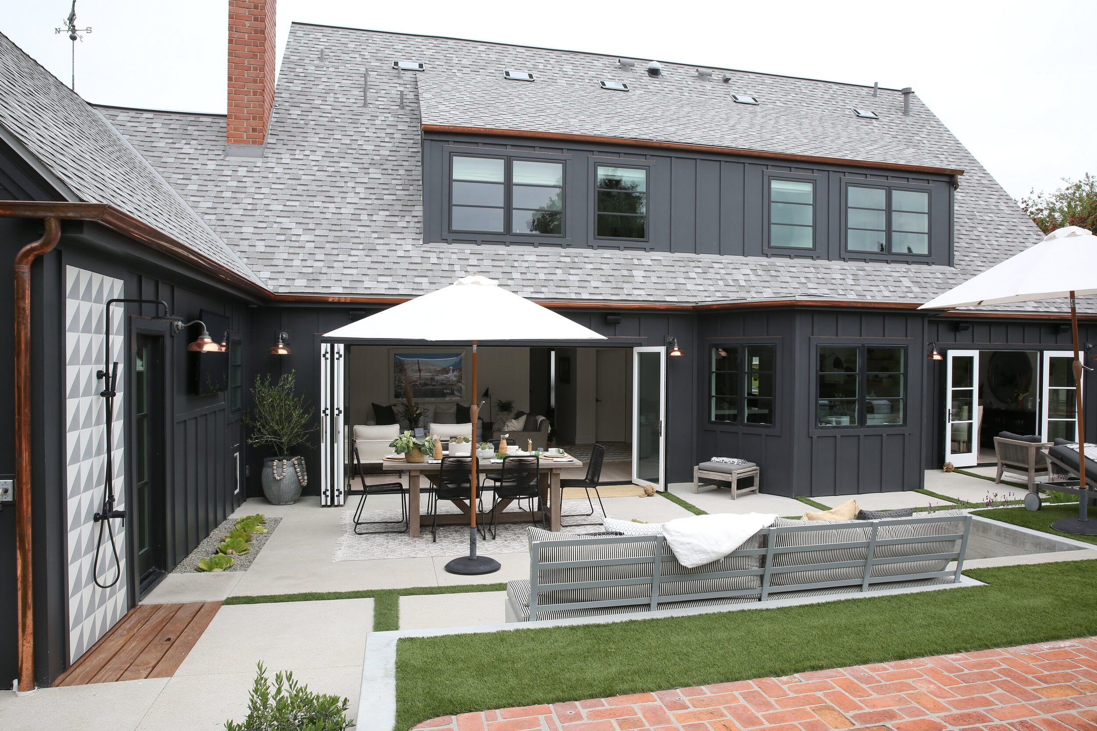 Renovated back-of-house with outdoor living by Shipwright Homes