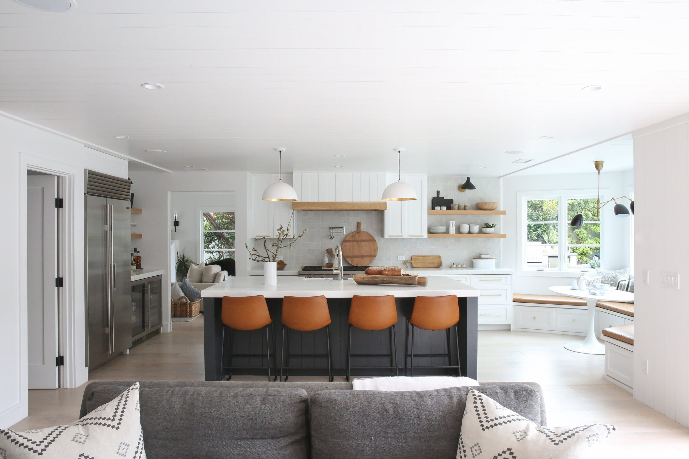 Designed kitchen with island and pendant lighting