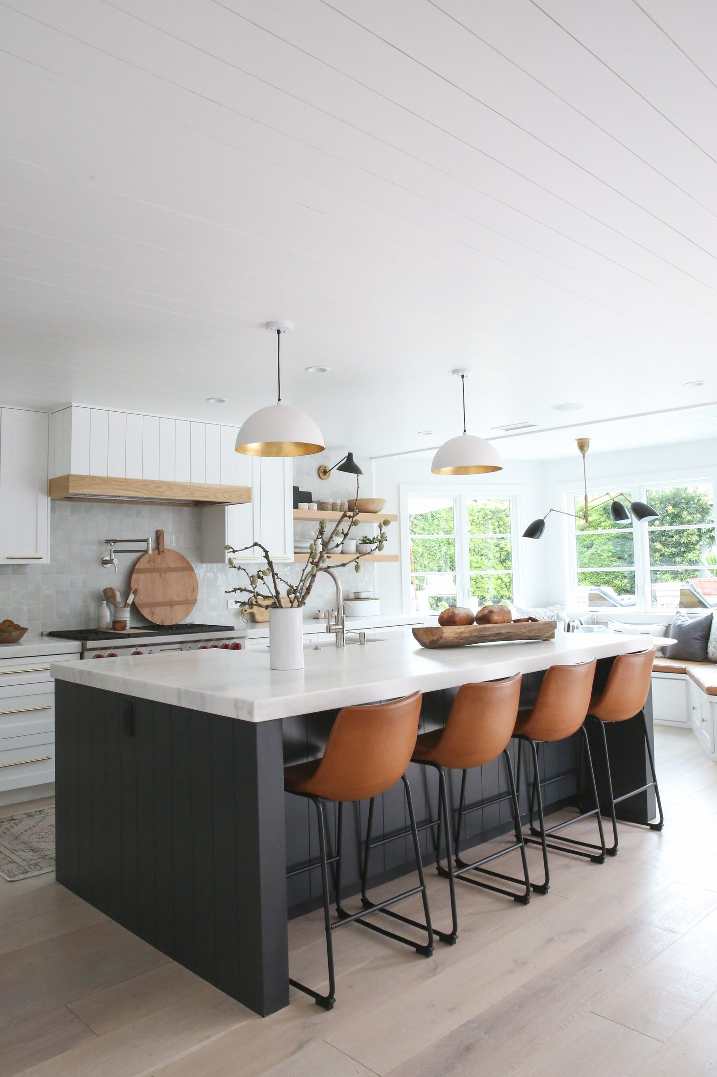 Kitchen island with seating and pendant lighting